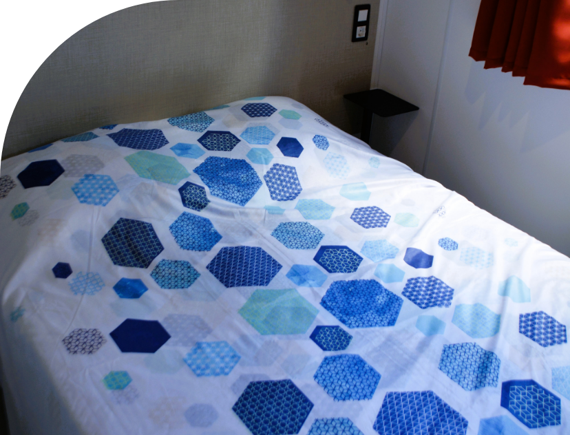 Bedroom with 1 large bed in the 2-bedroom mobile home