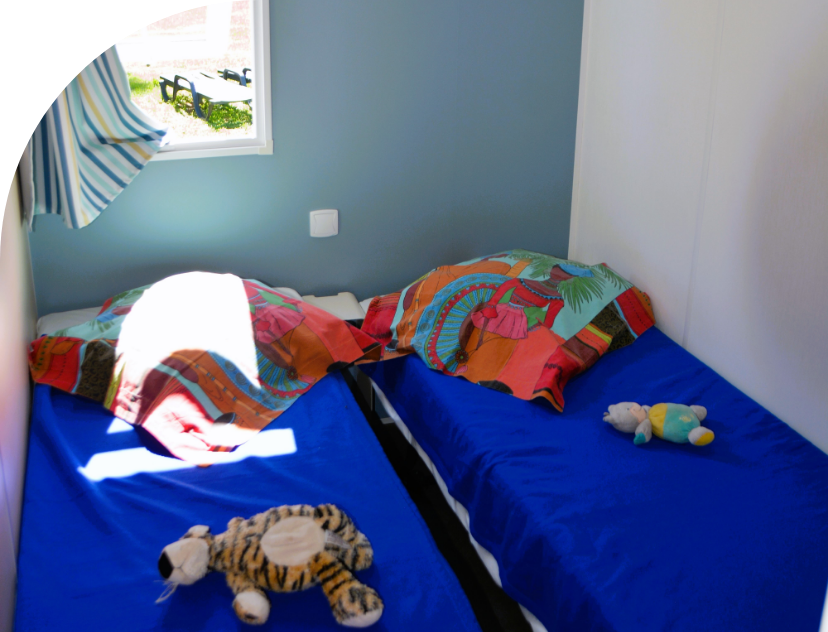 Kamer met 2 bedden in stacaravan Quattro
